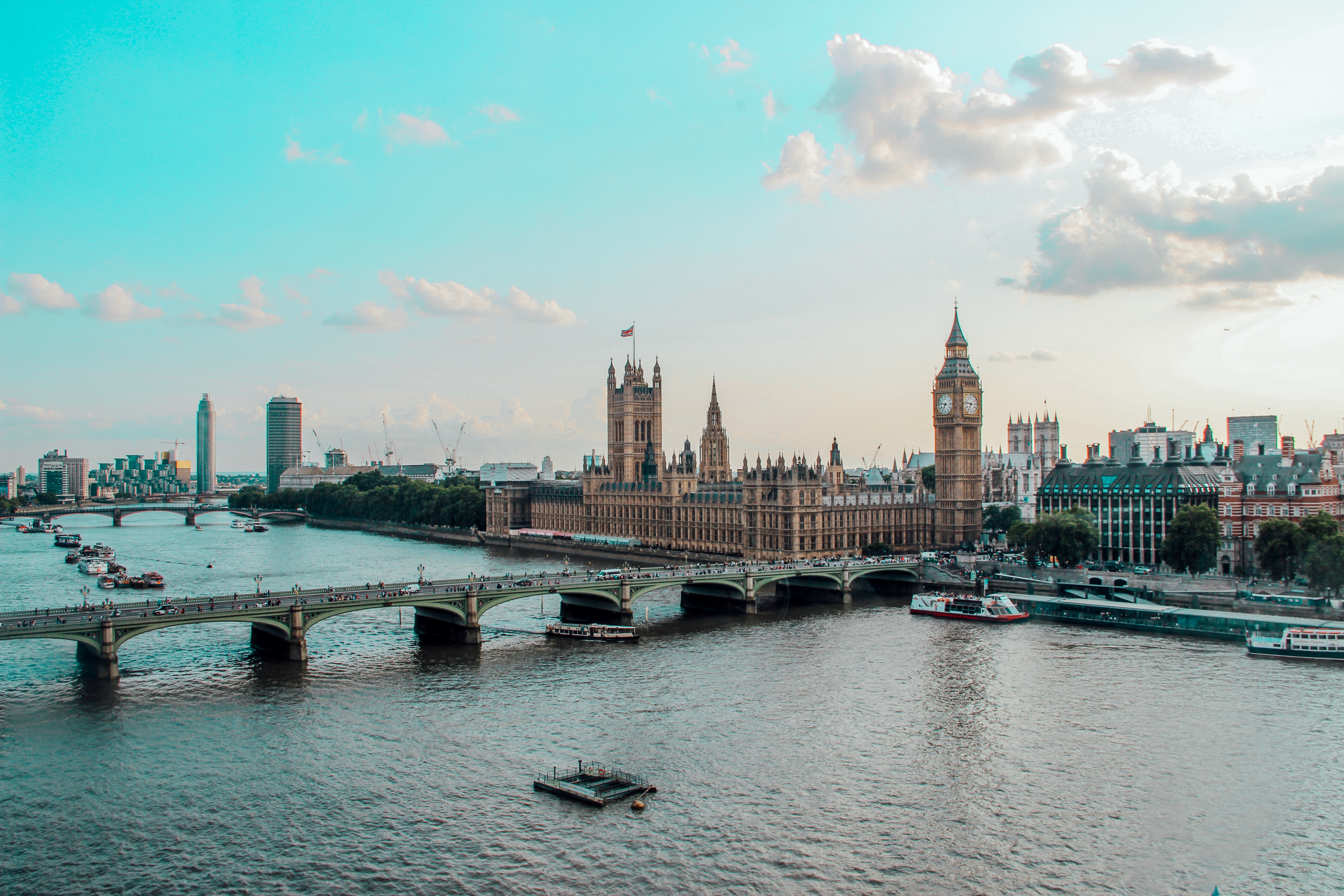 Captivating aerial view of Westminster Palace, Big Ben, and River Thames in London, UK.