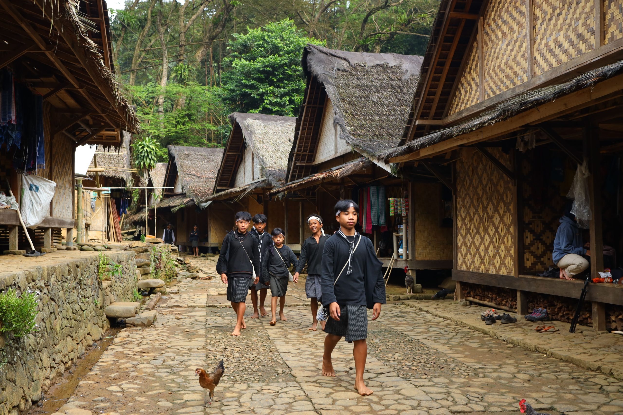 Explore the traditional lifestyle of Baduy people in Banten, Indonesia, showcasing unique architecture and culture.